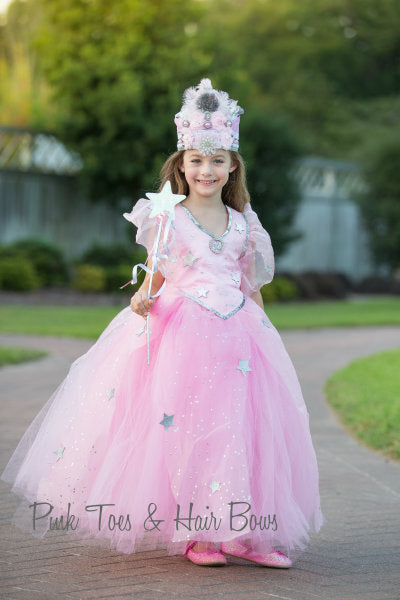 glinda the good witch pink dress Anyone have a size 10 pink dress that could be used for a Glinda the Good Witch Costume. Could be a flower girls dress or similar?